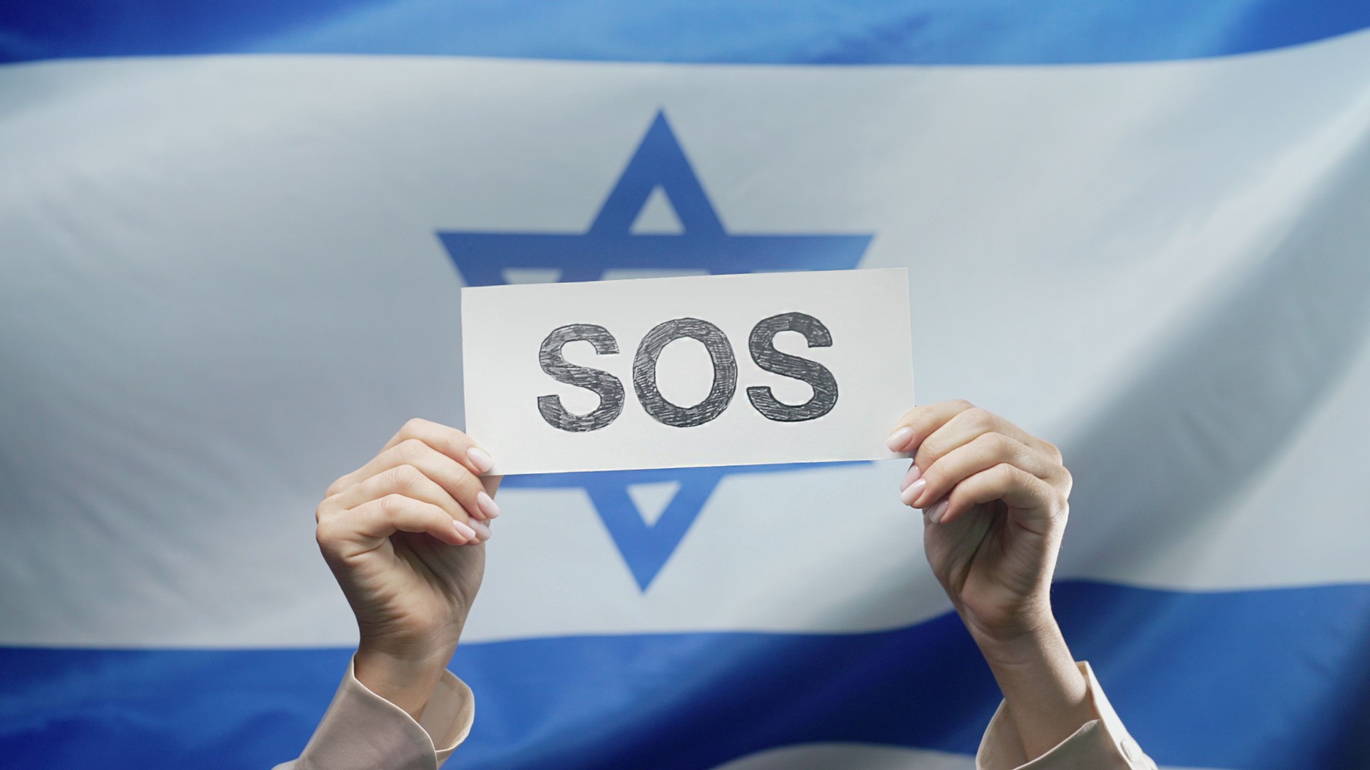 Female Hands With Sos, Alarm, Emergency Card On Israel National Flag Background
